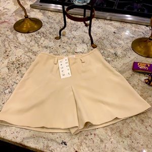 BIYA shorts on front side skirt on back .